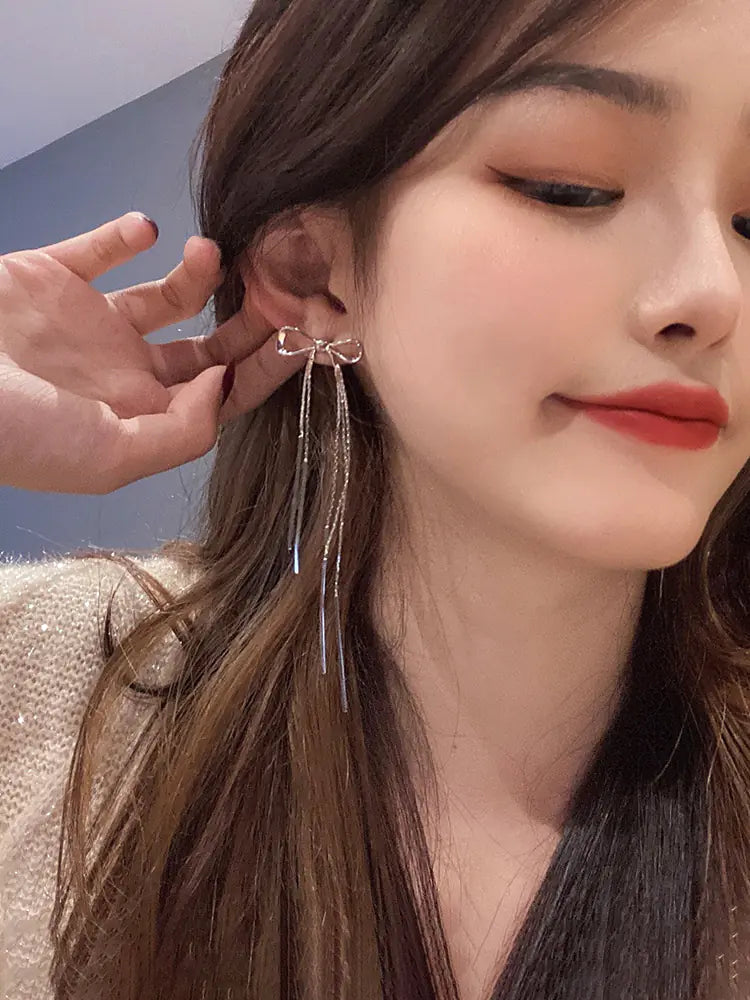 S925 Silver Long Tassel Earrings with Bow Design
